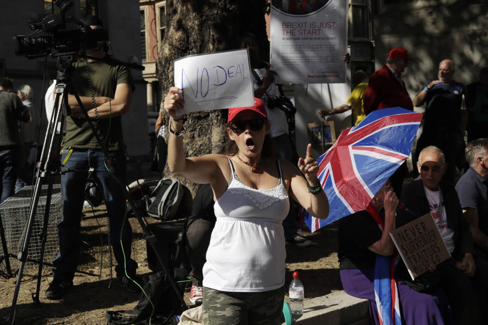A Brexit supporter protests outside the Supreme Court in London, Thursday, Sept. 19, 2019. The Supreme Court is set to decide whether Prime Minister Boris Johnson broke the law when he suspended Parliament on Sept. 9, sending lawmakers home until Oct. 14 — just over two weeks before the U.K. is due to leave the European Union. (AP Photo/Matt Dunham)