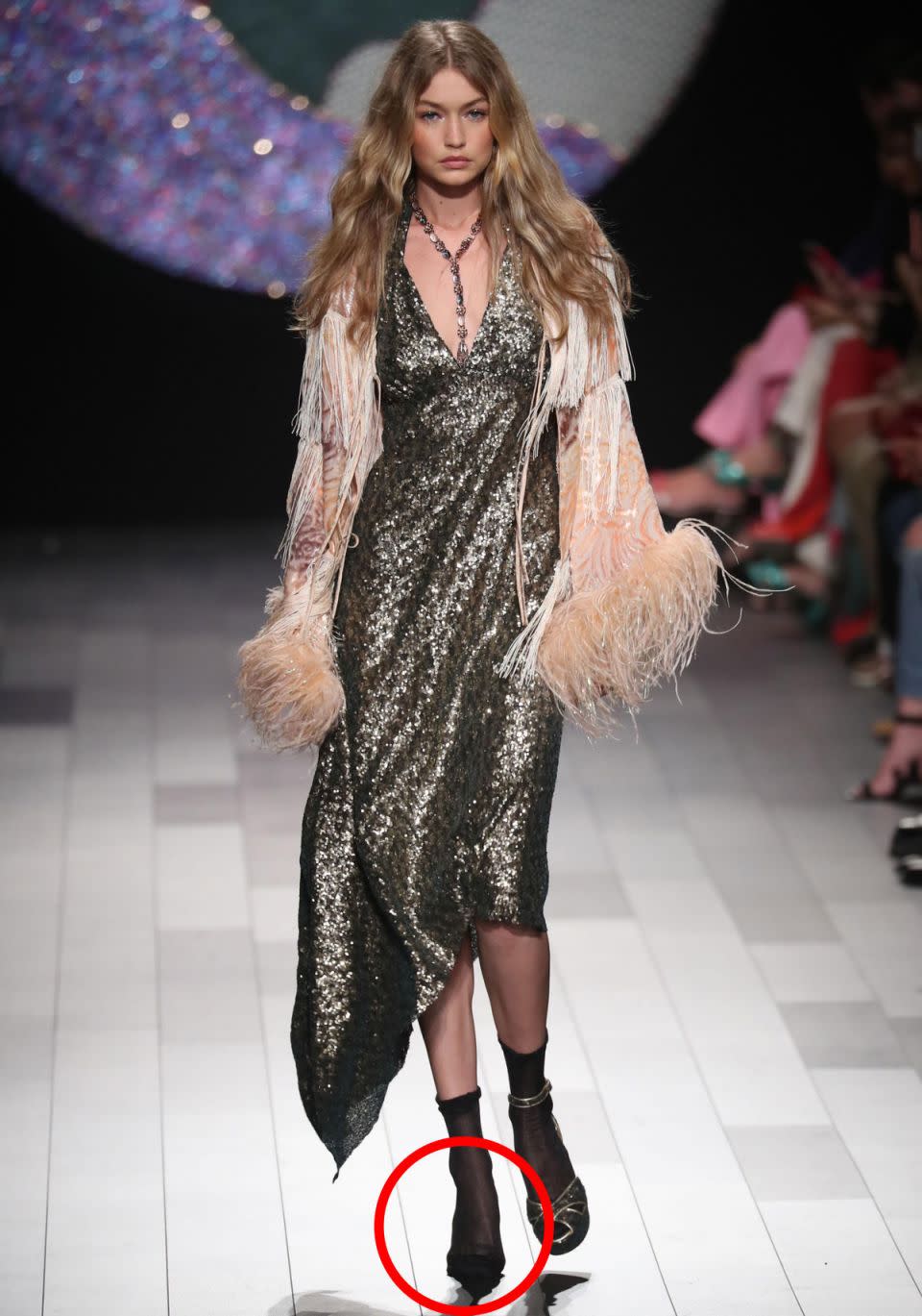 Just as Gigi Hadid hit the ramp at the Anna Sui show at New York Fashion Week on Monday, the 22-year-old's strappy heel on her right foot came off. Source: Getty