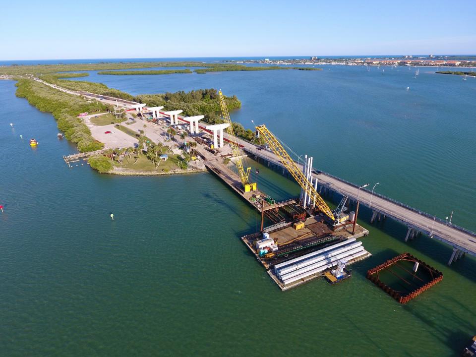 A drone captures work on the new North Causeway bridge in Fort Pierce on Feb. 24, 2024. There will be 347 pillars, of different sizes, used in building the new bridge that will span above Old Dixie Highway to meet U.S.1 on the west, according to Vecellio & Grogan Inc. whose workers placed pillars. It will replace the current drawbridge built in 1963, which is the D.H. "Banty" Saunders Bridge, designated by the 1965 Florida Legislature. David Howard Saunders was a state representative in the 1945 Legislature. He was a Fort Pierce City commissioner, and a lumberman for 40 years, according to the Miami News of March 7, 1945.