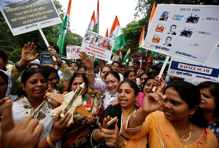 Supporters of Congress Party shout slogans during a protest demanding from government to disclose the details of Rafale fighter planes deal, in Mumbai, July 30, 2018. REUTERS/Francis Mascarenhas/Files