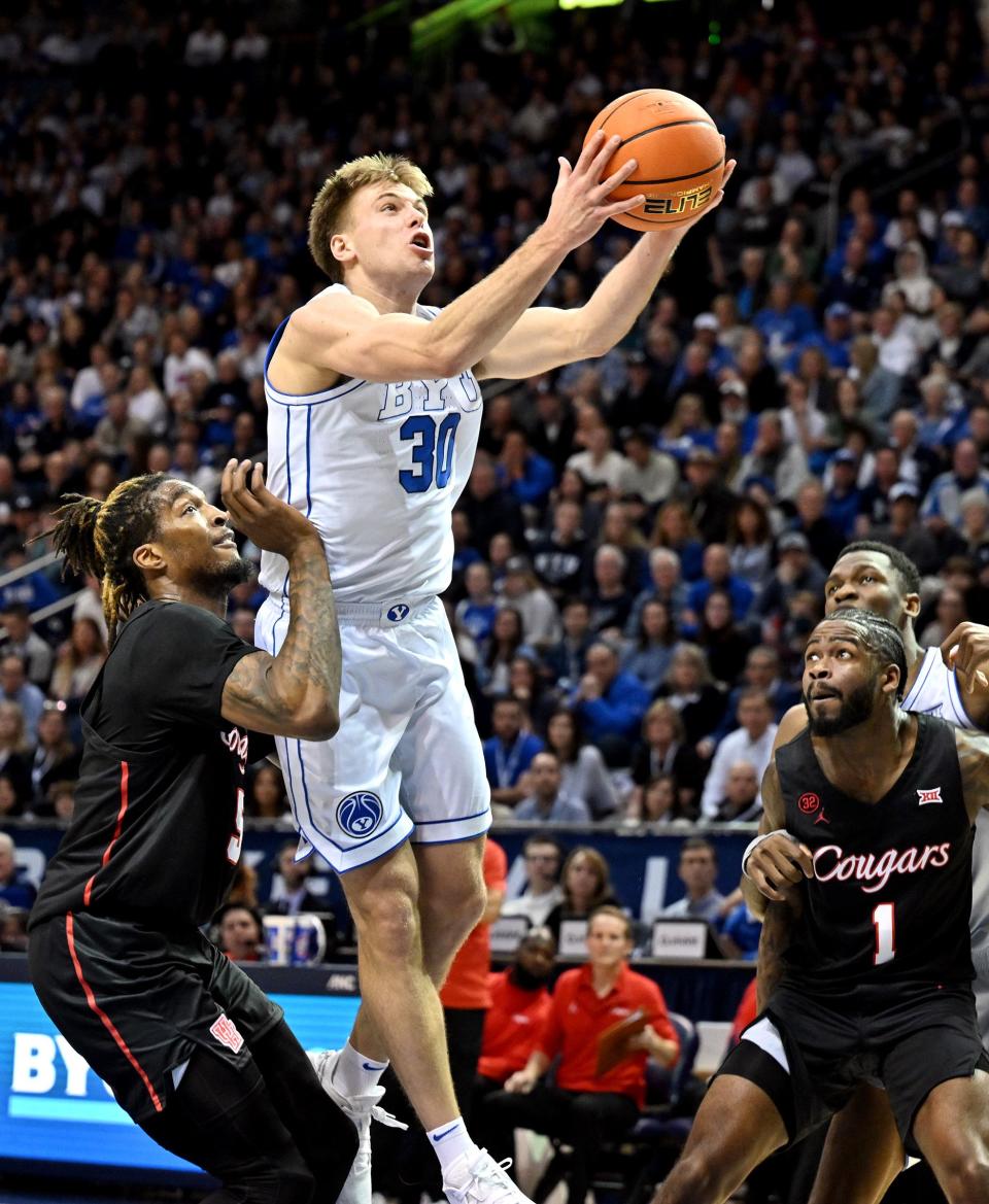 BYU guard Dallin Hall goes at the hoop during a game against Houston at the Marriott Center in Provo on Tuesday, Jan. 23, 2024. | Scott G Winterton, Deseret News