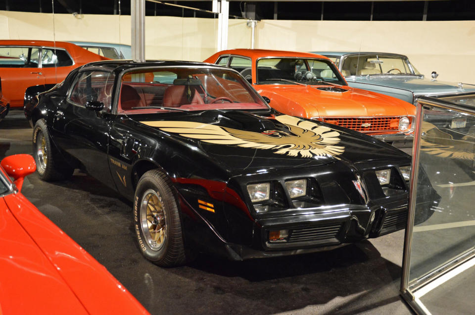 <p>This <strong>third-generation</strong> Pontiac Firebird Trans Am is one of several <strong>American muscle cars</strong> in the museum. Equipped with T-tops, it’s original and in like-new condition; odds are it was shipped from the US. The <strong>Chevrolet Nova</strong> behind it was modified into a <strong>drag racer</strong>, showing another facet of muscle car culture.</p>