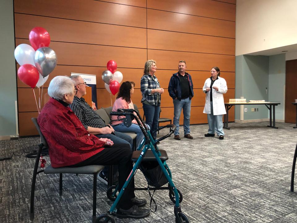 Dr. Jessica Birchem, right, speaks about Gary Locke, center, and his heart attack, during a Feb. 1, 2024, event at Mercy Hospital Springfield. Locke had a heart attack in 2019 and his wife performed CPR until EMS arrived.