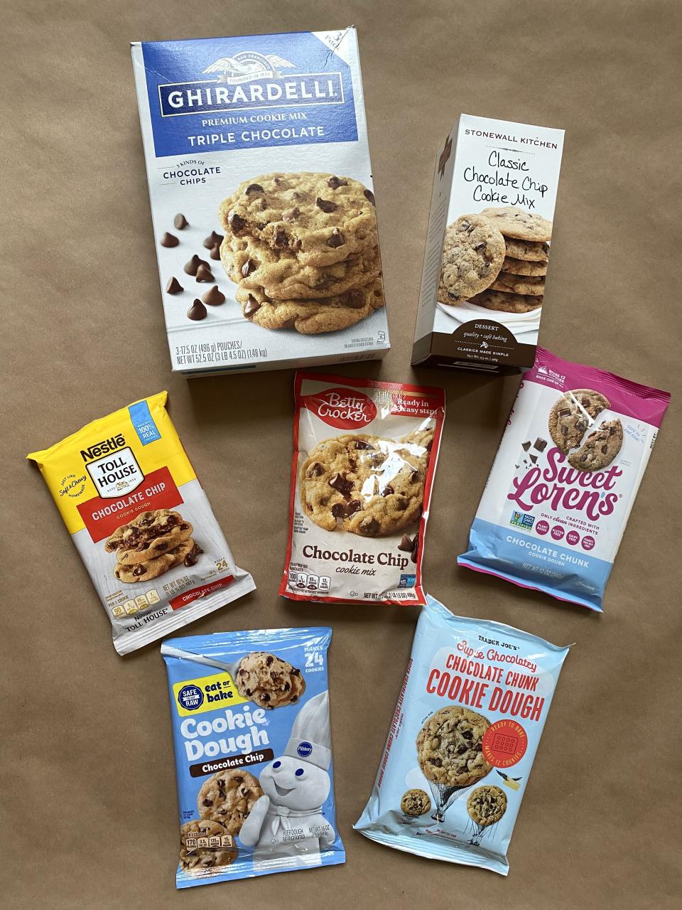 Seven packages of chocolate chip cookie dough from brands Ghirardelli, Stonewall Kitchen, Nestle Toll House, Betty Crocker, Sweet Loren's, Trader Joe's, and Pillsbury