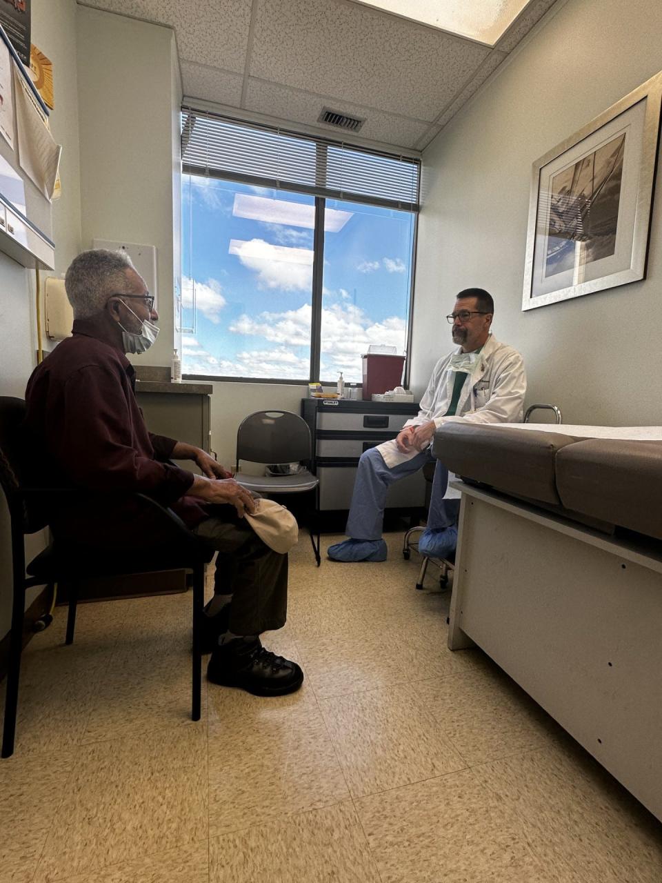 John Parker, left, checks in with his urologist Dr.William Bingham, following his Aquablation procedure at St.Francis. Parker credits the procedure with alleviating the uncomfortable symptoms associated with an enlarged prostate.