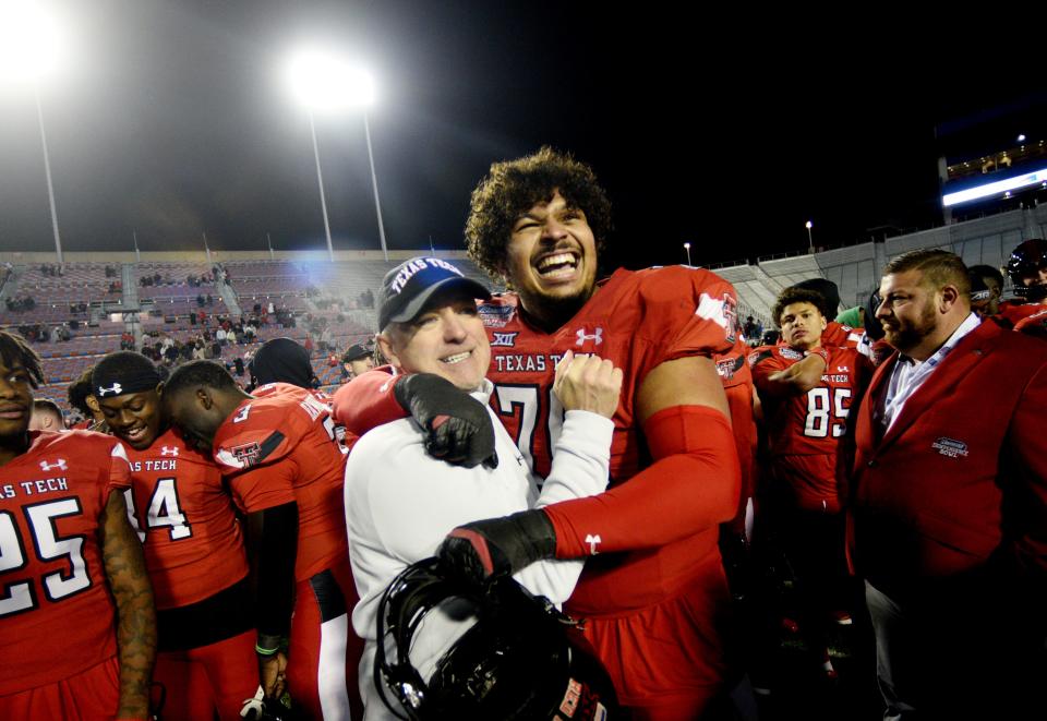Texas Tech's Caleb Rogers gives head coach Joey McGuire moments after they won the 47th Radiance Technologies Independence Bowl against Cal Saturday evening, December 16, 2023, at the Independence Stadium in Shreveport, Louisiana.