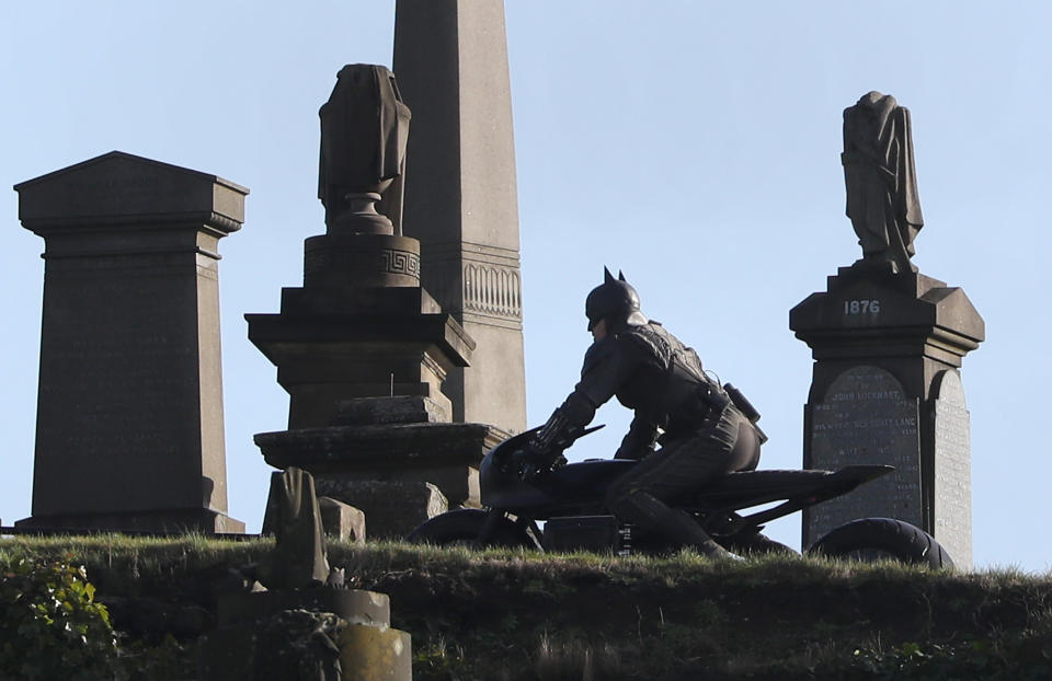 A man dressed as Batman during filming at the Glasgow Necropolis cemetery for a new movie for the surperhero franchise. (Photo by Andrew Milligan/PA Images via Getty Images)