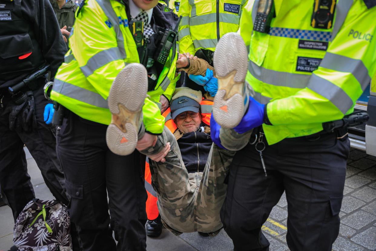 London, UK. 06th Nov, 2023. Protesters from Just Stop Oil block parts of the road on Whitehall near the cenotaph and Downing Street in a sit in (titled a 