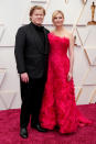 <p>"The Power of the Dog" nominees and real-life couple held close to one another on the red carpet. Dunst wore a bold ruffled look by Christian Lacroix to celebrate her first Ocasr nomination for Best Supporting Actress. (Photo by Kevin Mazur/WireImage)</p> 