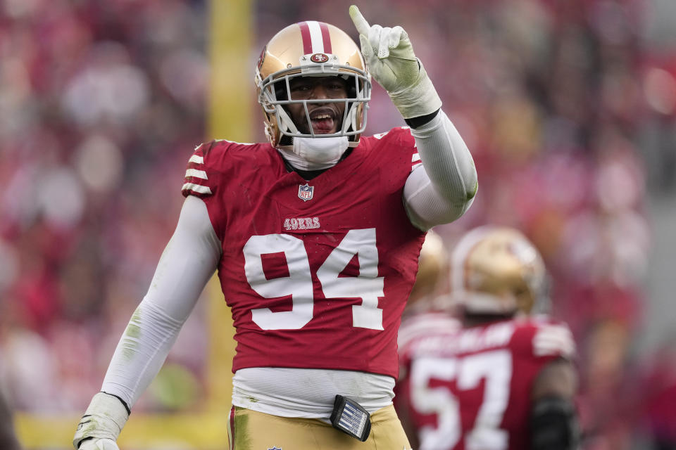 FILE - San Francisco 49ers defensive end Clelin Ferrell celebrates after sacking Seattle Seahawks quarterback Drew Lock during the second half of an NFL football game in Santa Clara, Calif., Sunday, Dec. 10, 2023. The Washington Commanders continued their roster makeover early on the second day of NFL free agency by agreeing to sign defensive end Clelin Ferrell. The team reached an agreement with Ferrell on a one-year contract, according to a person familiar with the contract. (AP Photo/Godofredo A. Vásquez, File)