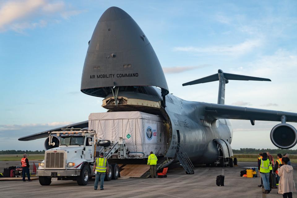 An Air Force C-5M Super Galaxy transport is seen at Kennedy Space Center's Launch and Landing Facility on Wednesday, Nov. 10, 2021, with the NOAA's GOES-T spacecraft. Once on orbit, the satellite will help forecasters and scientists better understand weather and climate.