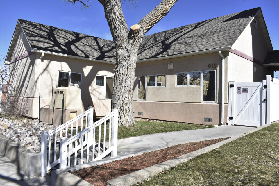 A tree stand outside the Wellspring Health Access clinic in Casper, Wyo., on Monday, April 24, 2023. The mayor of Casper has apologized for posting an image of a fire on Facebook in response to the abortion clinic opening in his city almost a year after an arson attack on the facility. (AP Photo/Matthew Brown)