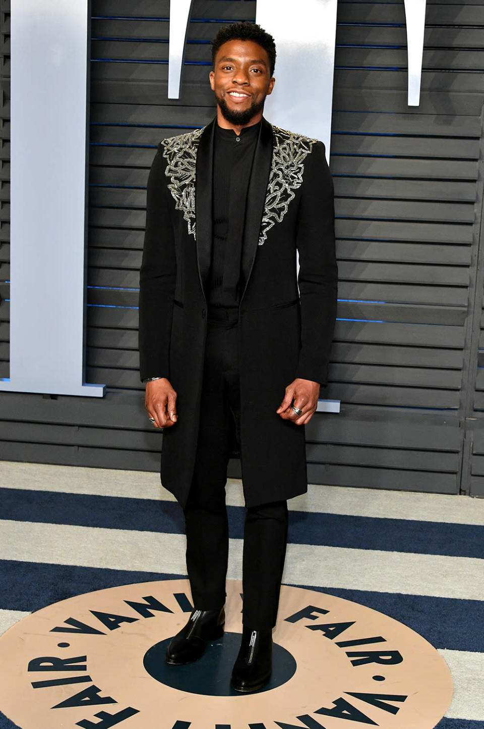 <p>The Black Panther actor’s Givenchy topcoat was praised for its regal Wakanda vibe. (Photo: Dia Dipasupil/Getty Images) </p>