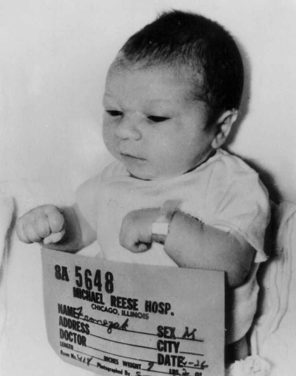 FILE - This April 26, 1964 file photo shows new-born Paul Joseph Fronczak shortly after his birth at Michael Reese Hospital in Chicago. The baby was taken from his mother's arms by a woman dressed as a nurse who told her he needed a medical exam and then never returned him to the nursery. (AP Photo, File)