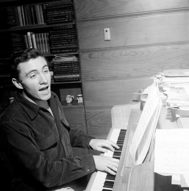 Griffin at his piano in the 1950s
