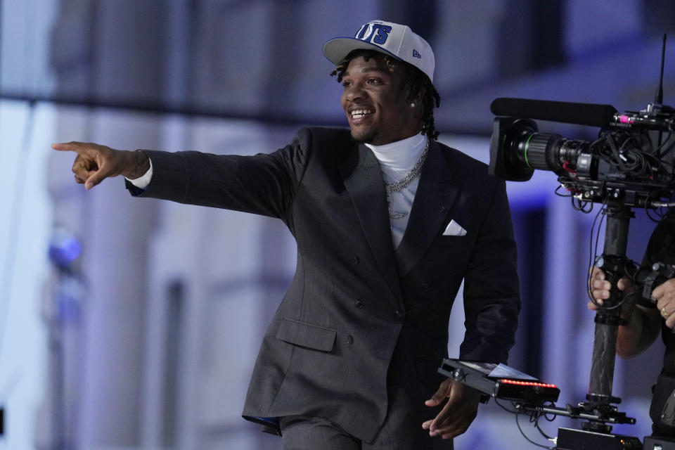 Florida quarterback Anthony Richardson reacts after being chosen by the Indianapolis Colts with the fourth overall pick during the first round of the NFL football draft, Thursday, April 27, 2023, in Kansas City, Mo. (AP Photo/Jeff Roberson)