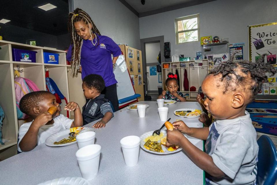 Toddler teacher Breaunna King looks after her students during lunch break at Sunrise Early Learning and Development Center in Fort Worth on Thursday, Oct. 26, 2023.