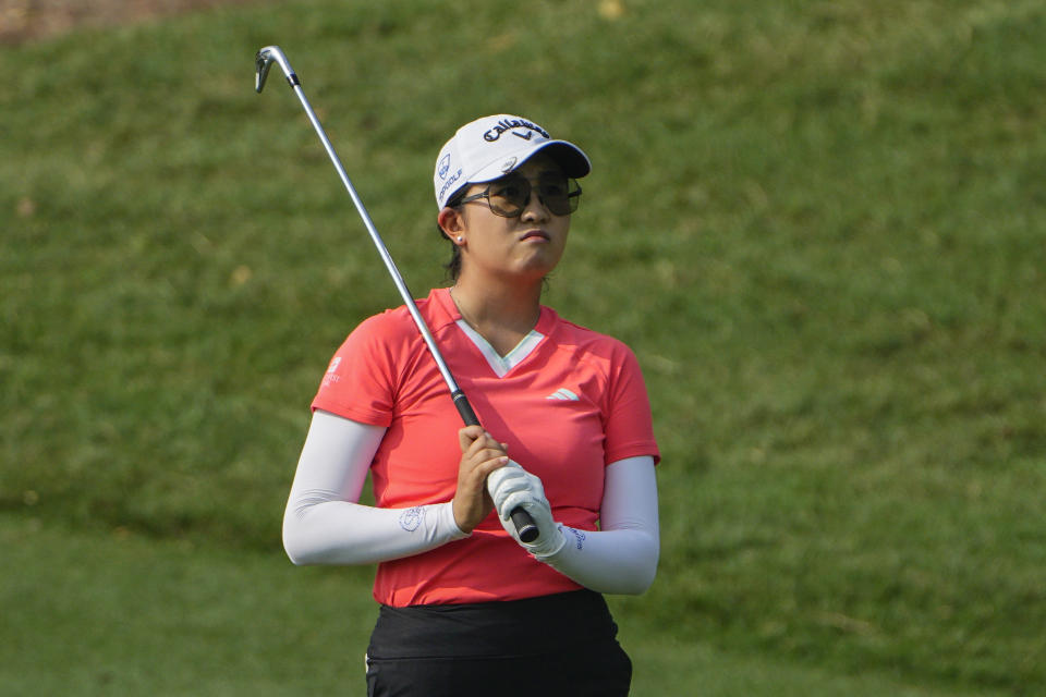 Rose Zhang of the United States watches her shot on the fairway on the second hole during the third round of the LPGA Maybank Championship in Kuala Lumpur, Malaysia, Saturday, Oct. 28, 2023. (AP Photo/Vincent Thian)