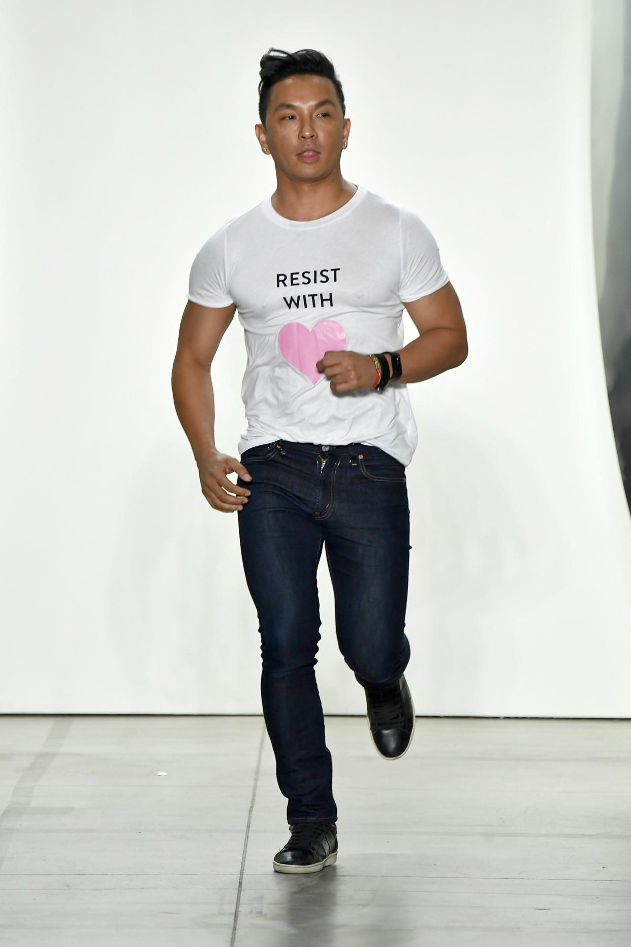 Designer Prabal Gurung walks out to take a bow after his Spring 2018 runway show during New York Fashion Week. (Photo: Getty Images)