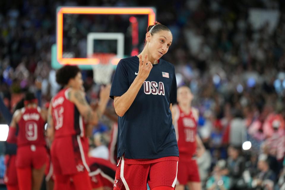 Aug 11, 2024; Paris, France; United States shooting guard Diana Taurasi (12) celebrates after defeating France in the women's gold medal game during the Paris 2024 Olympic Summer Games at Accor Arena. Mandatory Credit: James Lang-USA TODAY Sports ORG XMIT: OLY-890073 ORIG FILE ID: 20240811_lbm_no5_177.JPG