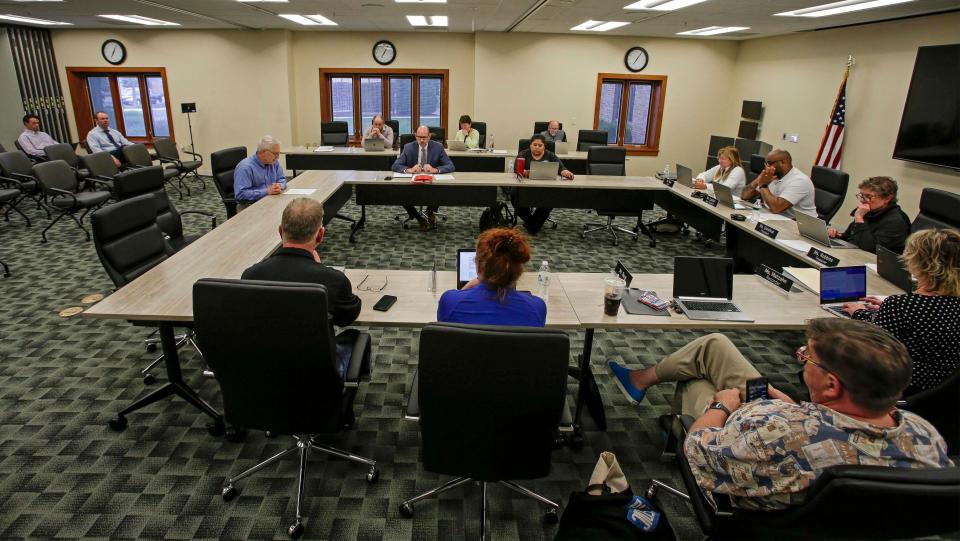 An overall during the public portion of the school board session at the district offices, Tuesday, May 10, 2022, in Sheboygan, Wis.