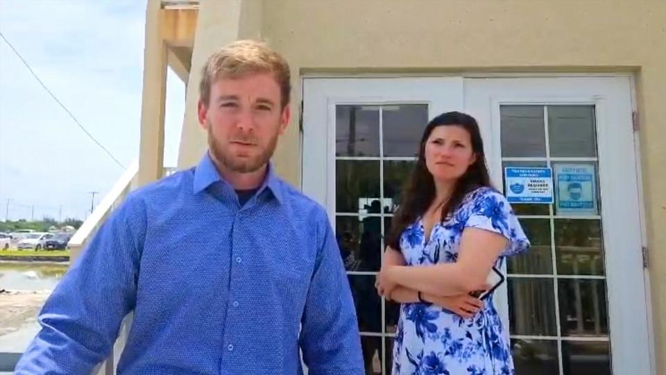 PHOTO: Tyler Wenrich, who was arrested in the Turks and Caicos Islands for illegally importing ammunition into the islands, stands with his wife Jeriann Wenrich after being sentenced to prison and fined $9,000 , Tuesday, May 28, 2024. (ABC News)