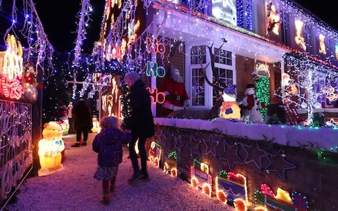 A house covered in lights in New Milton, Hampshire - Credit: Andrew Matthews/PA