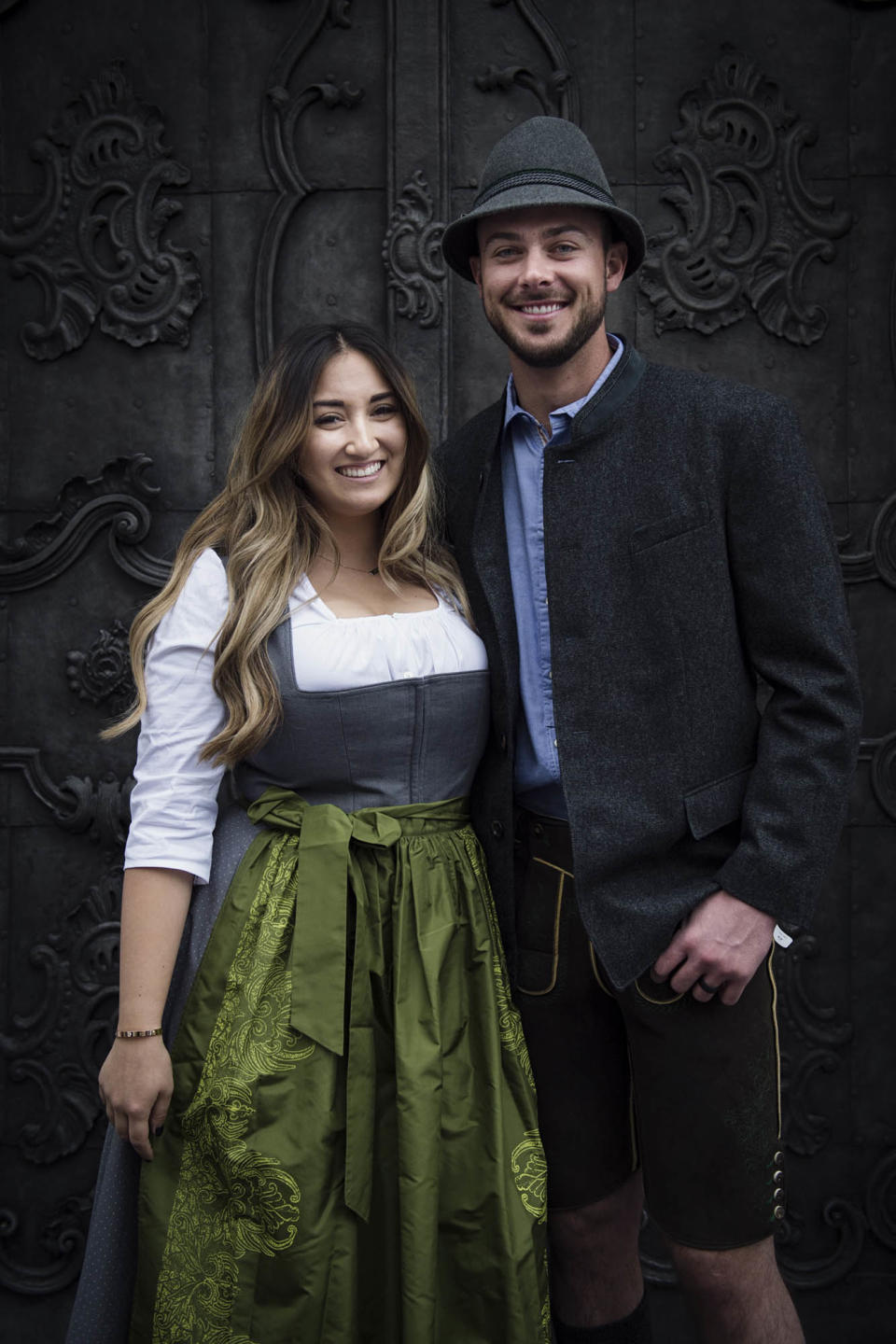 Kris Bryant and his wife, Jessica, pose in traditional Austrian clothes while on vacation in Salzburg. (Photo via Red Bull)