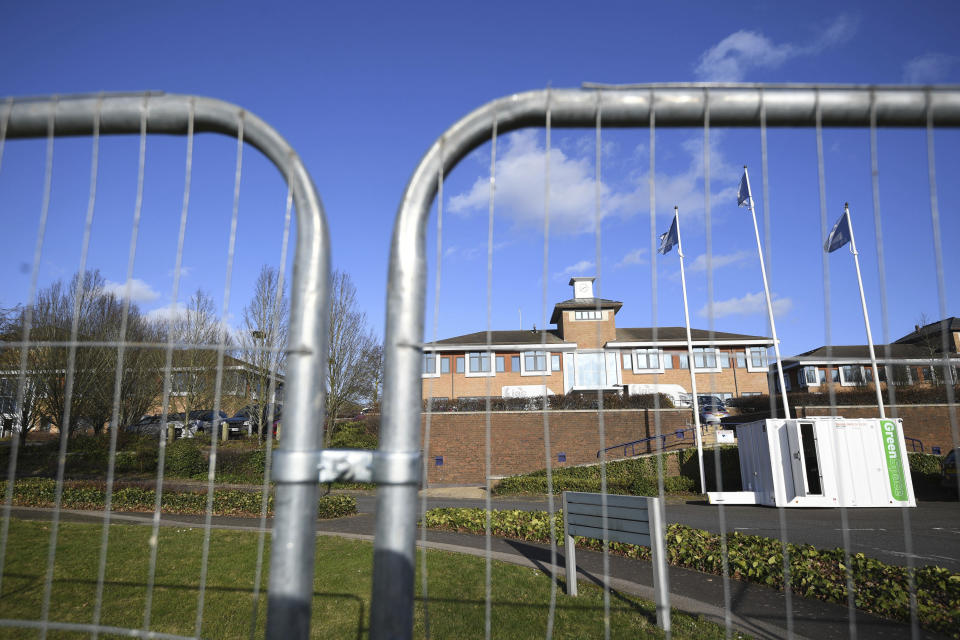 A view of Kents Hill Park Training and Conference Centre, ahead of the repatriation to the UK of the latest Coronavirus evacuees who are due to land at RAF Brize Norton on Sunday, in Milton Keynes, England, Saturday, Feb. 8, 2020. A viral outbreak that began in China has infected more than 34,800 people worldwide. (Joe Giddens/PA via AP)