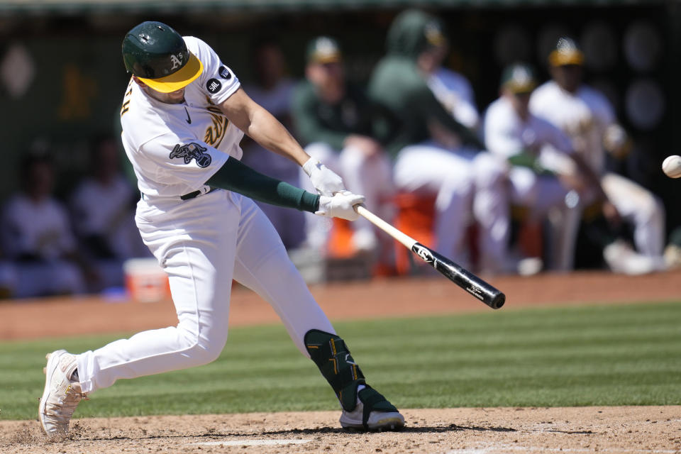 Oakland Athletics' Kevin Smith hits a three-run home run against the Toronto Blue Jays during the sixth inning of a baseball game in Oakland, Calif., Wednesday, Sept. 6, 2023. (AP Photo/Jeff Chiu)