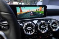 Car racing game is seen on the screen inside a Mercedes Benz vehicle at the CES Asia exhibition in Shanghai