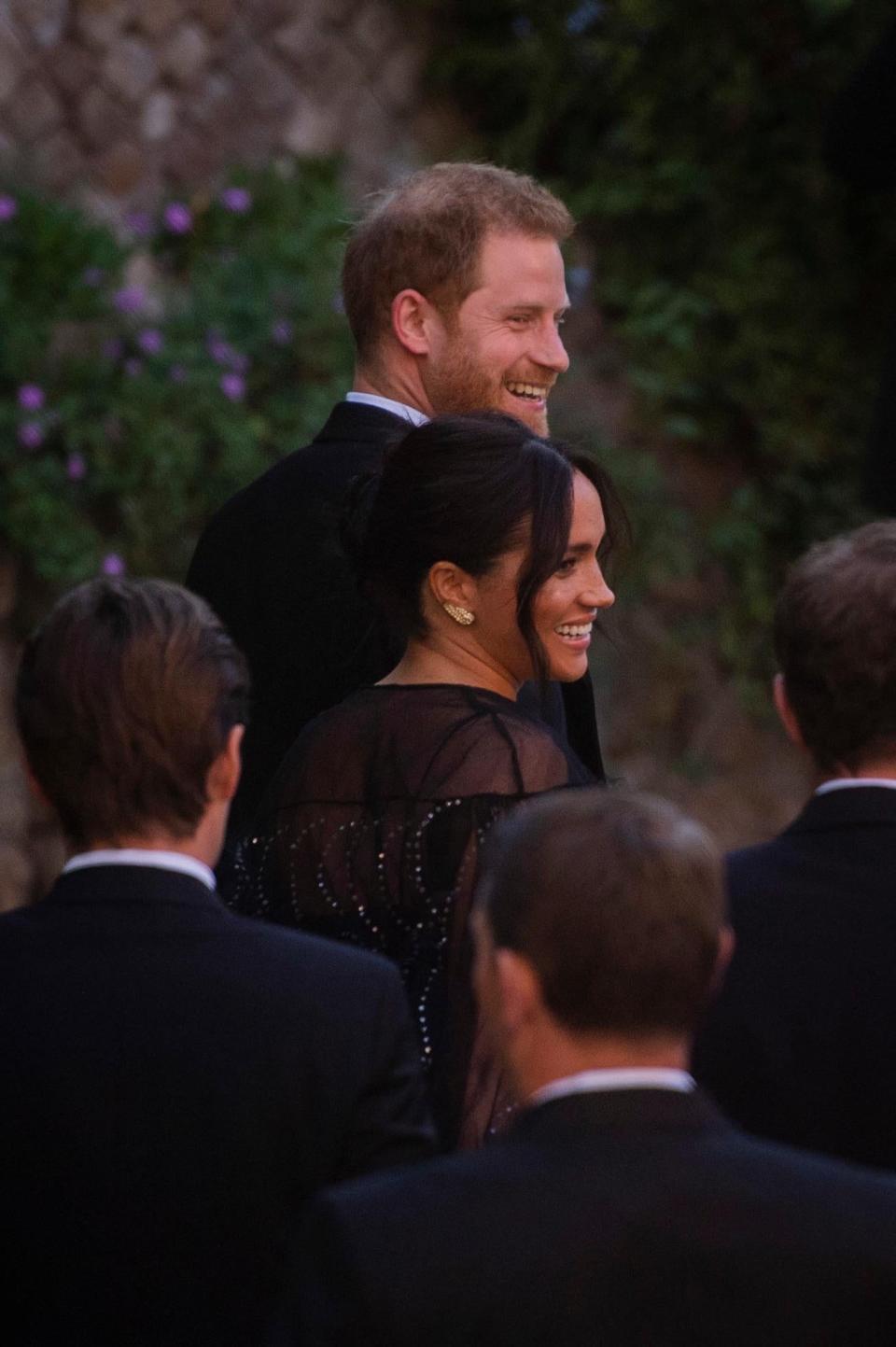 Harry and Meghan arrive for the wedding ceremony at Villa Aurelia (Rex Features)