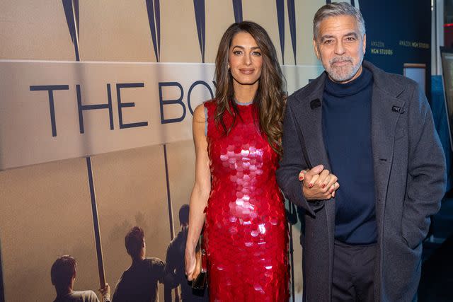 <p>Mat Hayward/Getty</p> Amal and George Clooney attend an MGM Seattle community screening of <em>The Boys in the Boat</em> on Dec. 7, 2023