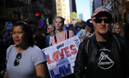 People march for marriage equality of same-sex couples in Sydney, Australia, September 10, 2017. REUTERS/Steven Saphore