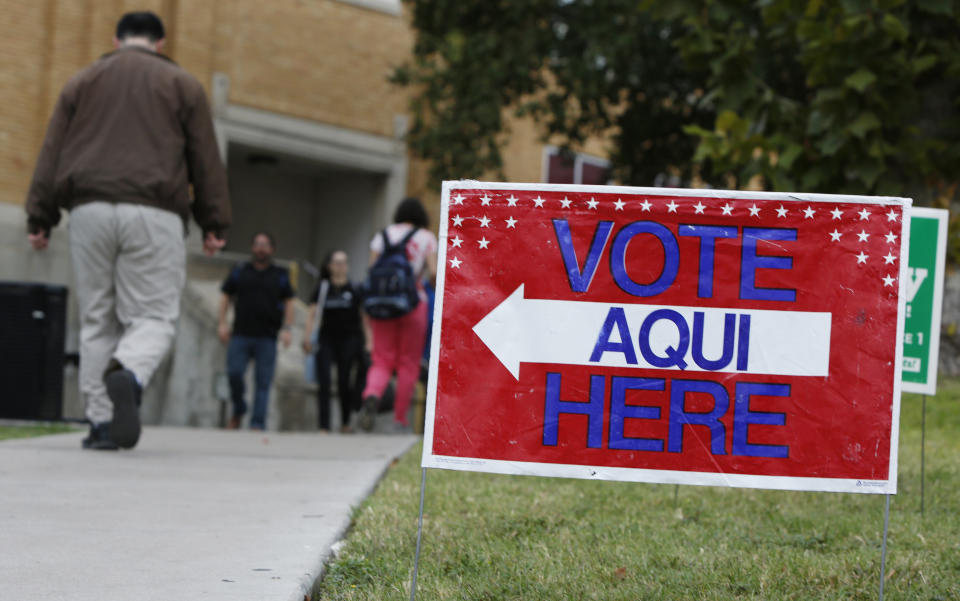 A sign shows the way to the polling station at Austin Community College on Nov. 4, 2014 in Austin, Texas. Voters headed to the polls today to decide a number of tight races.&nbsp; (Photo: Erich Schlegel via Getty Images)