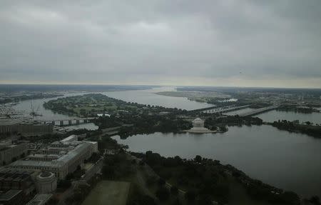 The Jefferson Memorial (C) is surrounded by the Tidal Basin (lower right), the Washington Channel (L), and the Potomac River (top right) in Washington October 1, 2014. Photograph taken from atop the Washington Monument. REUTERS/Gary Cameron