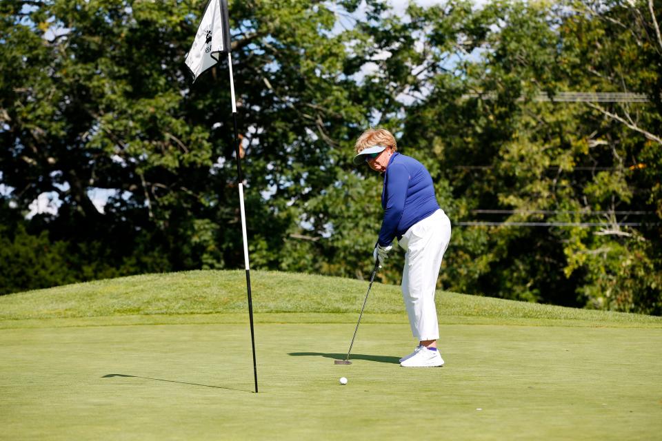 Lori Keegan putts during the 43rd Annual Country Club of New Bedford Women's Invitational Four-Ball.