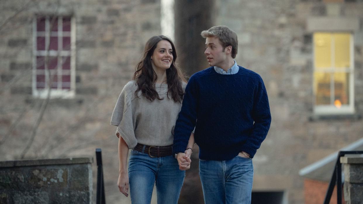  Kate Middleton (Meg Bellamy) and Prince William (Ed McVey) holding hands in The Crown season 6. 