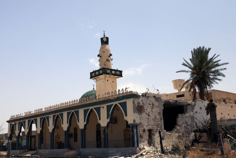 A damaged mosque is seen after Libyan's internationally recognised government regained control over the city, in Tripoli