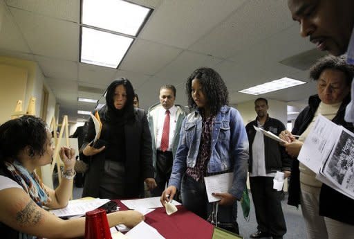 Job seekers wait in line to meet with a recruiter during a job fair in Brooklyn, New York in April 2012. Fresh figures on the US jobs market come out Friday, with a lot more than usual riding on them: new stimulus from Federal Reserve, and the poll numbers for President Barack Obama as he fights to keep his job