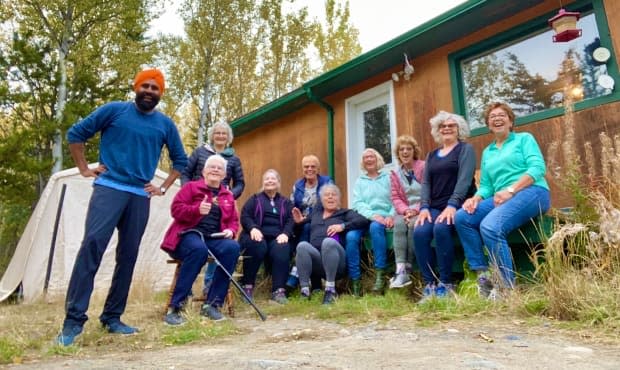 A group of Saskatchewan women who graduated in 1969 still get together every other September. Their latest reunion took these young-at-heart 70-year-olds to the Yukon to learn bhangra dancing. (Gurdeep Pandher/Twitter - image credit)