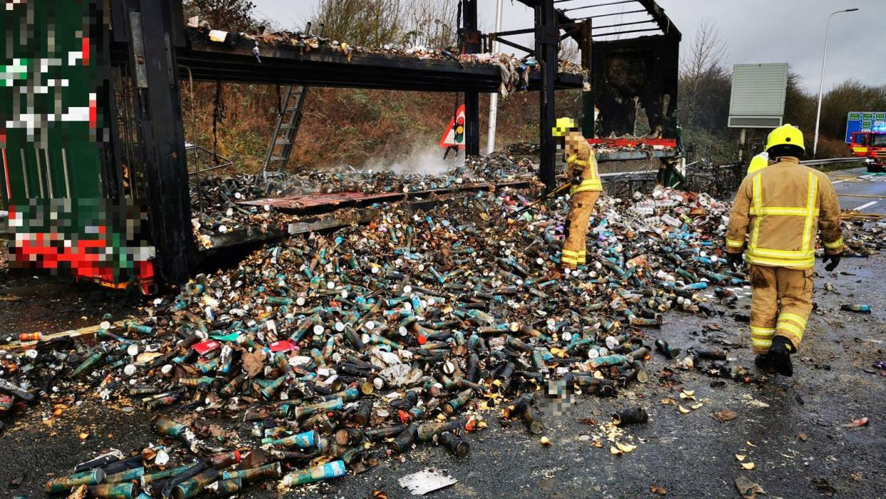 A lorry filled with Pringles containers caught fire (Picture: Highways England)