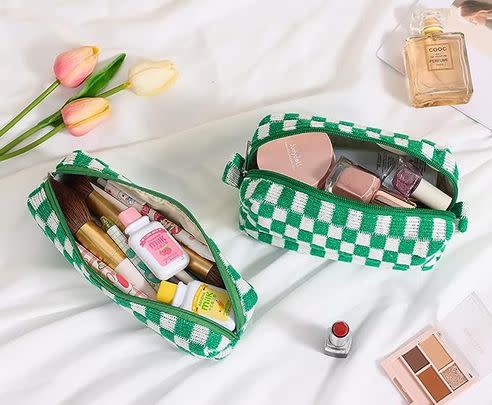 A set of checkered makeup pouches to keep everything in one place