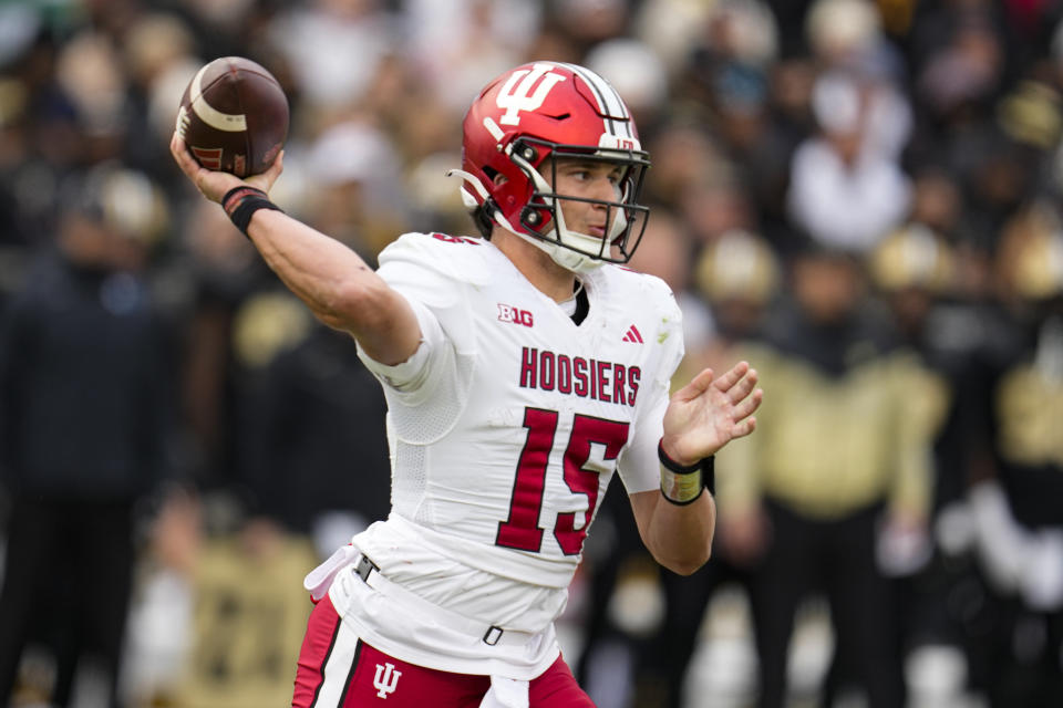 FILE - Indiana quarterback Brendan Sorsby (15) throws against Purdue during the first half of an NCAA college football game in West Lafayette, Ind., Saturday, Nov. 25, 2023. Sorsby, who transferred to Cincinnati from Indiana, is expected to take over as the Bearcats starter with the departure of Emory Jones after he played for three schools over the past six seasons. (AP Photo/Michael Conroy, File)