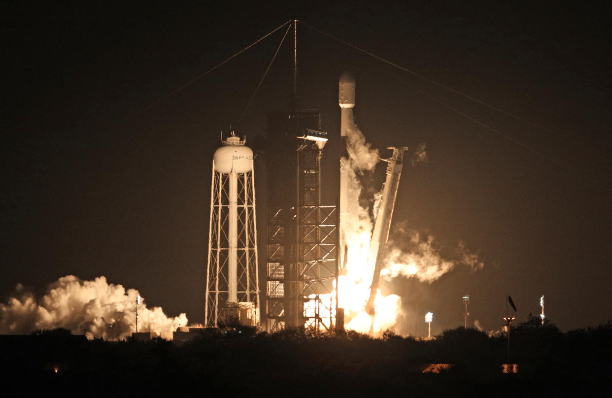 A SpaceX Falcon 9 rocket lifts off from launch pad LC-39A at the Kennedy Space Center with the Intuitive Machines' Nova-C moon lander mission, in Cape Canaveral, Florida, on February 15, 2024. The IM-1 mission is part of NASA's Commercial Lunar Payload Services (CLPS) program to understand more about the Moon's surface ahead of the coming Artemis missions. Intuitive Machines' Odysseus lander would be the first US spacecraft to land on the moon in over 50 years. It is expected to land near the south pole of the moon on February 22. (Photo by Gregg Newton / AFP) (Photo by GREGG NEWTON/AFP via Getty Images)