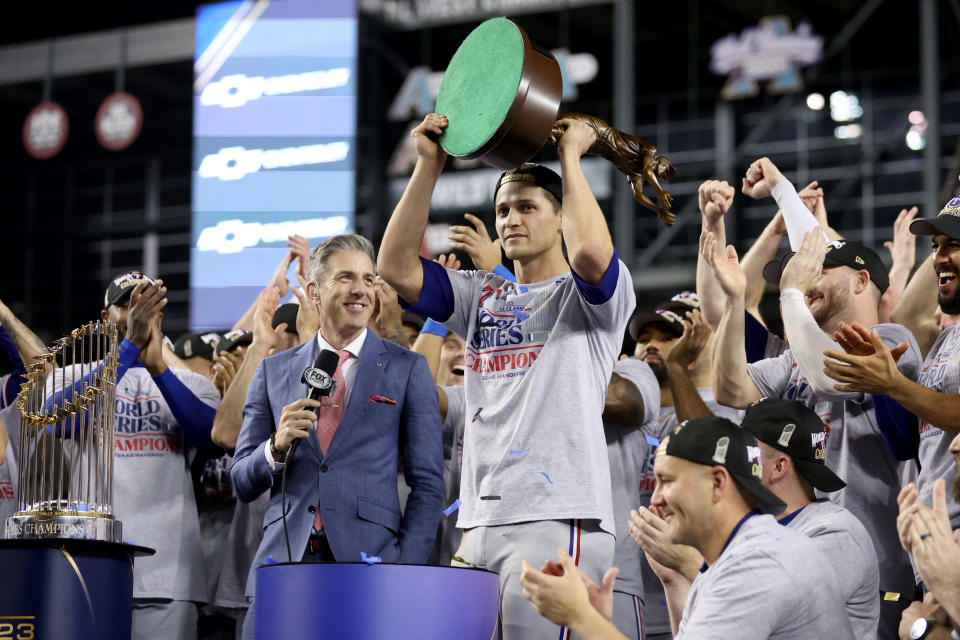 PHOENIX, ARIZONA - NOVEMBER 01: Corey Seager #5 of the Texas Rangers hoists the trophy after being named the Willie Mays World Series Most Valuable Player Award after the Texas Rangers beat the Arizona Diamondbacks 5-0 in Game Five to win the World Series at Chase Field on November 01, 2023 in Phoenix, Arizona. (Photo by Christian Petersen/Getty Images)