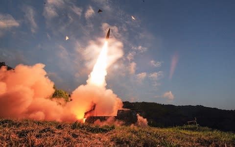 South Korea's Hyunmu-2 ballistic missile is fired during an exercise aimed to counter North Korea's nuclear test - Credit: South Korean Defense Ministry/Getty