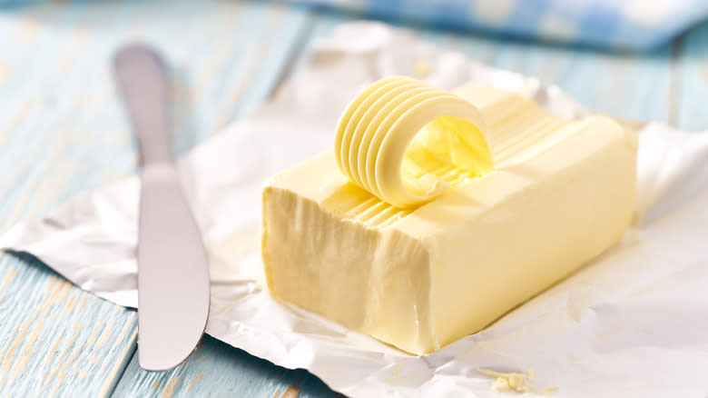 Stick of butter with knife 