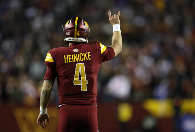 Commanders QB Taylor Heinicke chugs beer, crushes can on his head at a  Capitals game