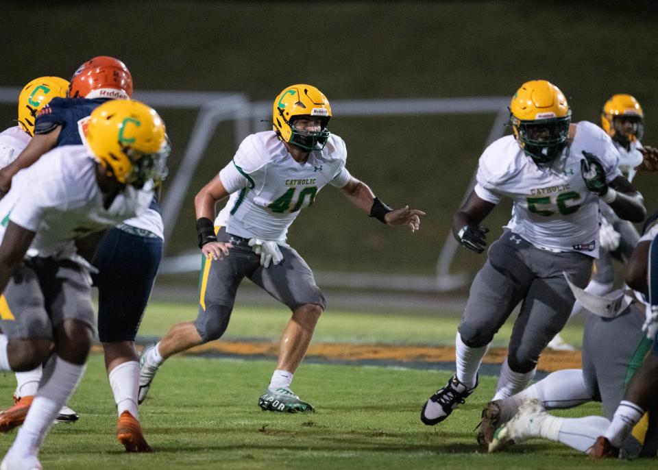 Turner Mclaughlin (40) and Derion Gould (56) follow the play during the Pensacola Catholic vs Escambia football game at Escambia High School in Pensacola on Friday, Sept. 1, 2023.